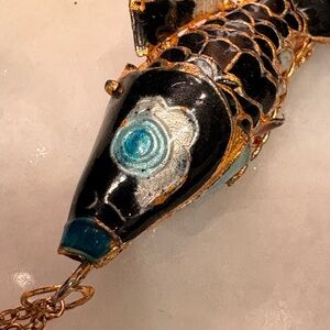 Articulated fish pendant, highly collectible